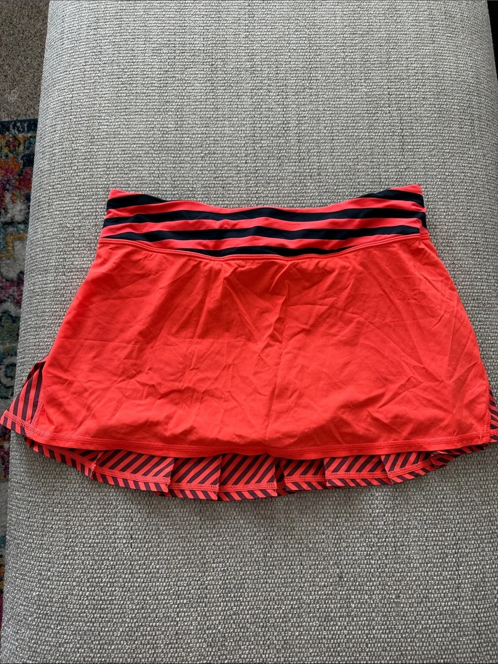 Lululemon neon orange/coral and navy skirt